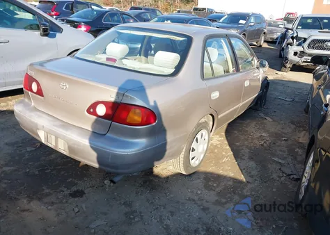 2001 Toyota Corolla Le from USA, damaged, VIN 2T1BR12E41C428657